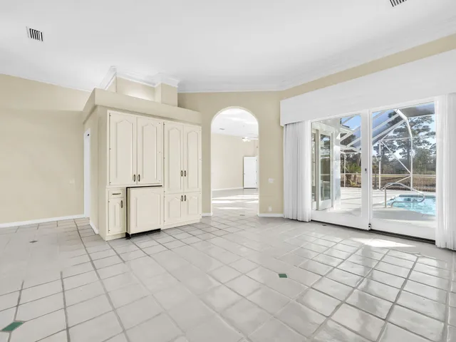 a view of a backyard with sitting area