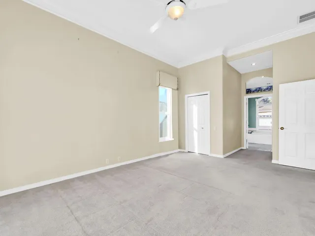 a spacious bathroom with a bathtub and a shower