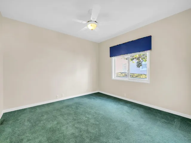 a view of swimming pool with a yard