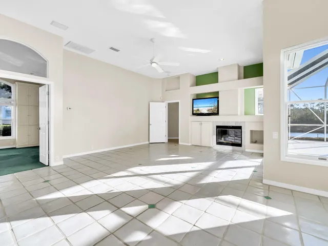 a kitchen with a stove a sink and a refrigerator