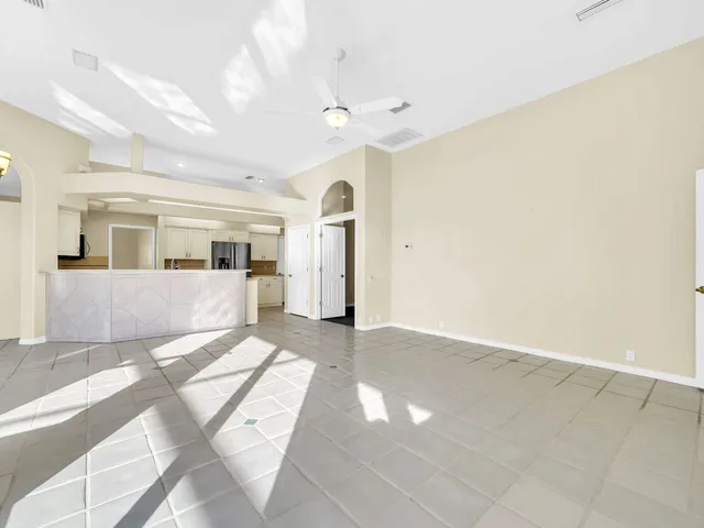 a kitchen with stainless steel appliances a stove sink and microwave