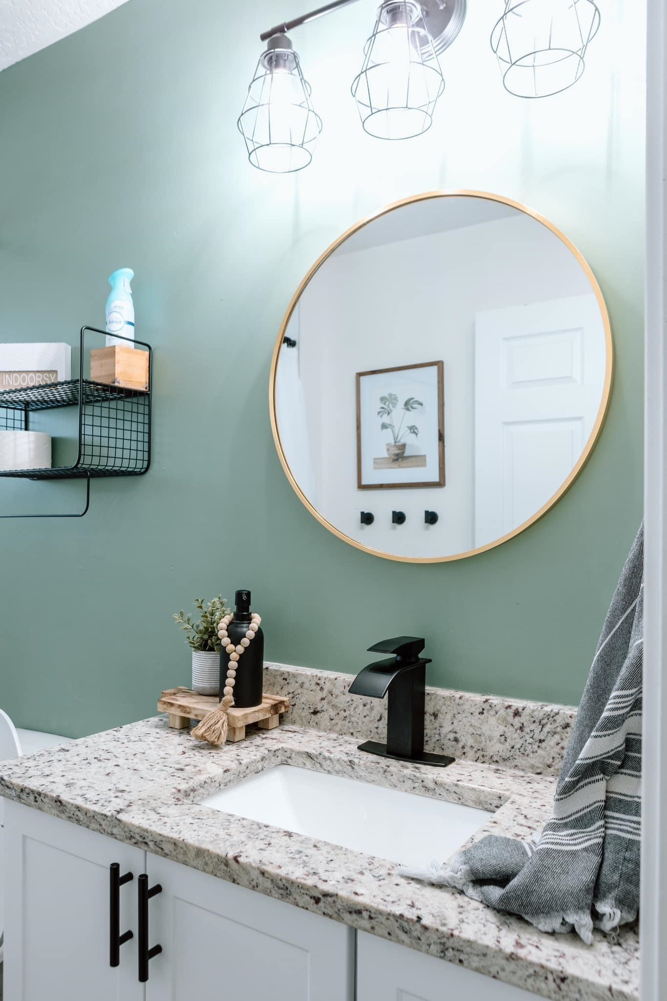 1148 Prince Road St. Augustine, FL 32086 - Photo 12 of 12 a bathroom with a sink and a mirror