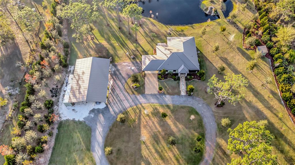 7330 Crabgrass Road St. Cloud, FL 34773 - Photo 53 of 60 a view of a swimming pool with a patio