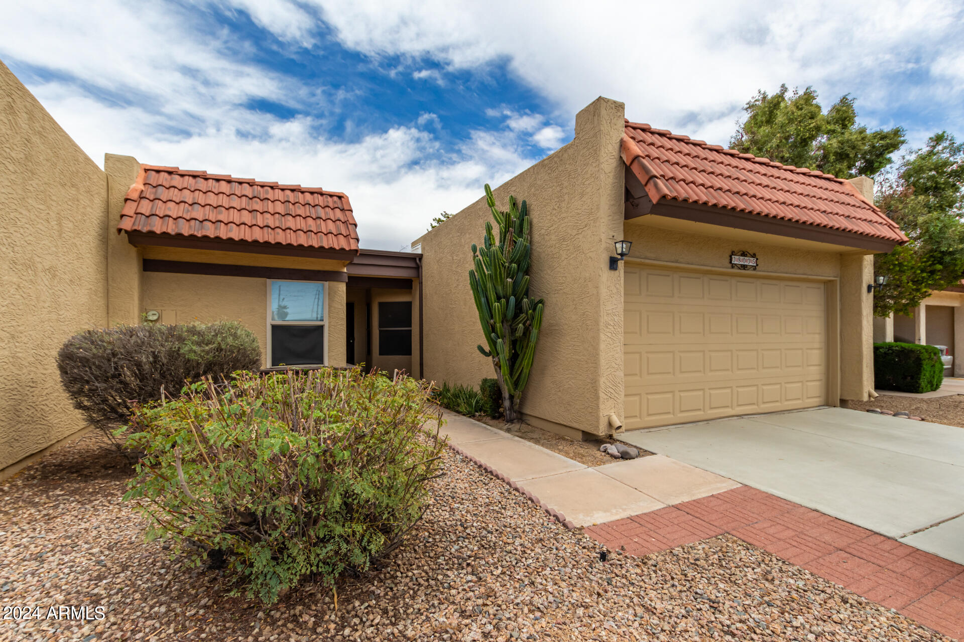 18035 North 24th Place Phoenix, AZ 85032 - Photo 1 of 22 a view of a house with a yard