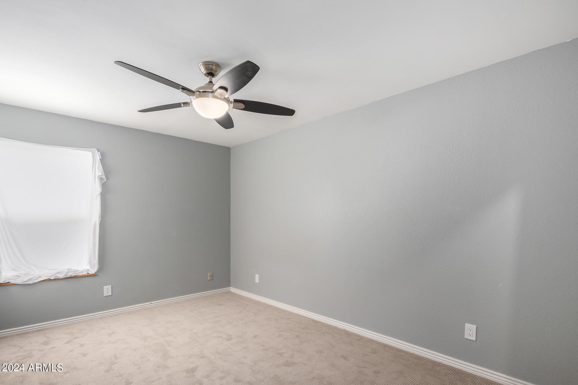 18035 North 24th Place Phoenix, AZ 85032 - Photo 13 of 22 a view of an empty room