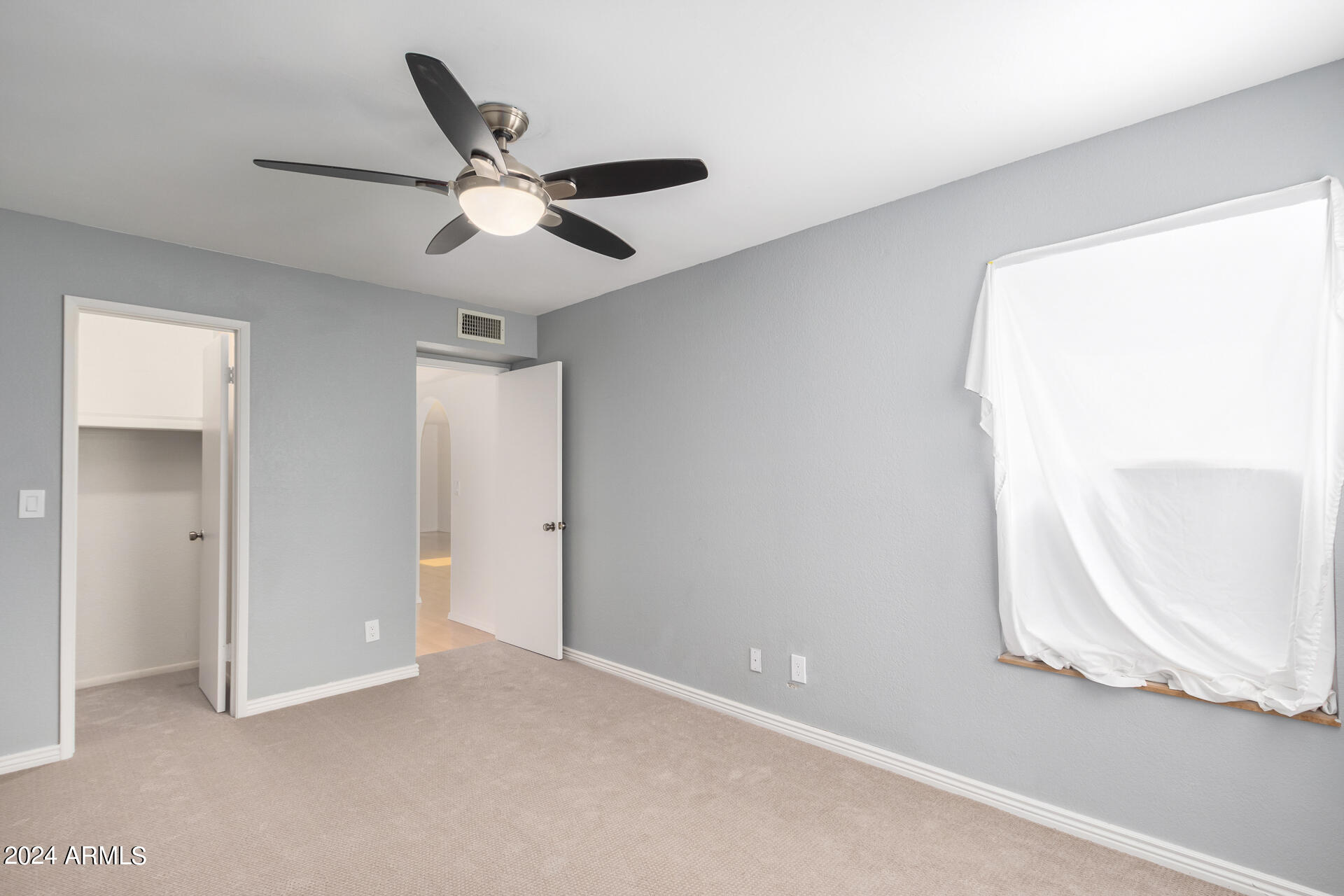 18035 North 24th Place Phoenix, AZ 85032 - Photo 15 of 22 a view of an empty room