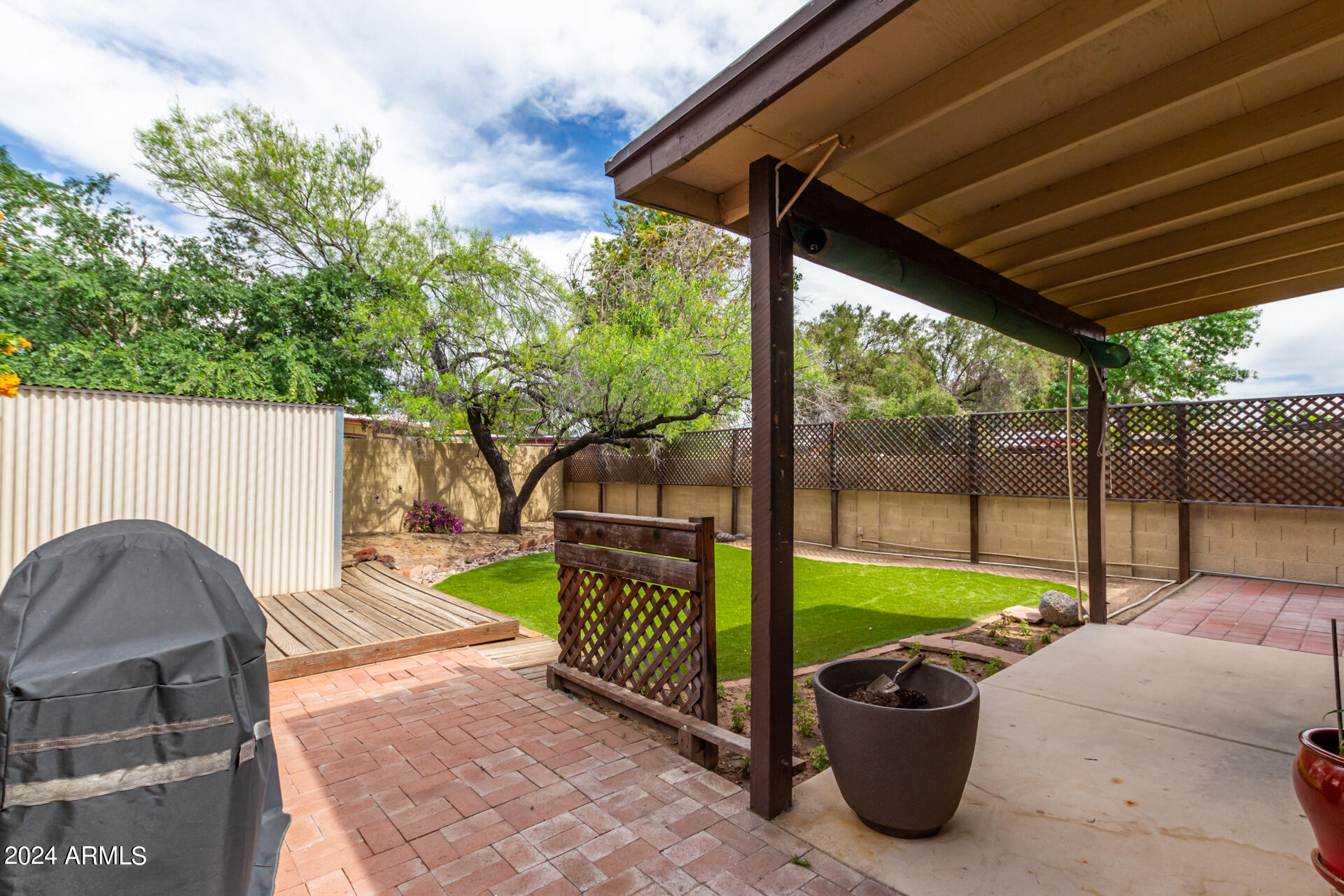 18035 North 24th Place Phoenix, AZ 85032 - Photo 22 of 22 a view of backyard with swimming pool