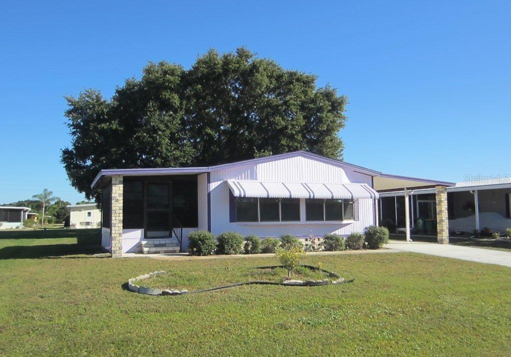 6276 Greenfinch Road, Unit 12 Englewood, FL 34224 - Photo 1 of 1 Front