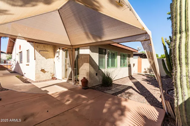 a view of a back yard of the house