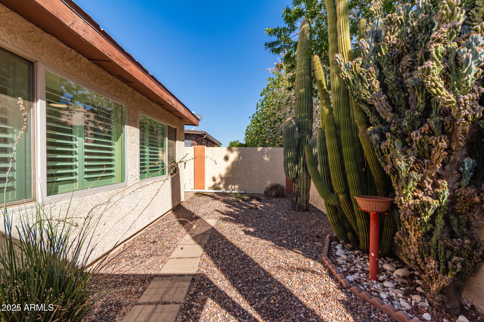 542 South Higley Road, Unit 3 Mesa, AZ 85206 - Photo 21 of 33 a view of house with backyard