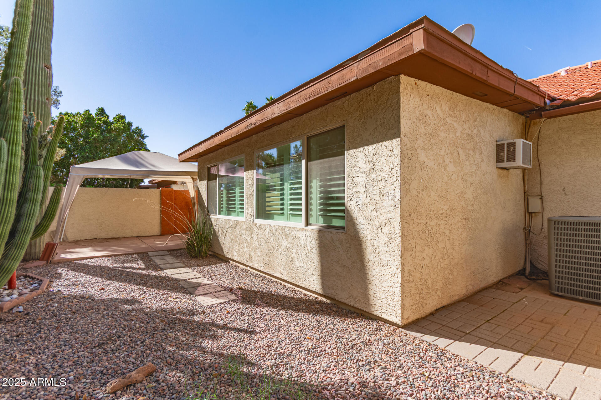 542 South Higley Road, Unit 3 Mesa, AZ 85206 - Photo 22 of 33 a view of a house with a yard