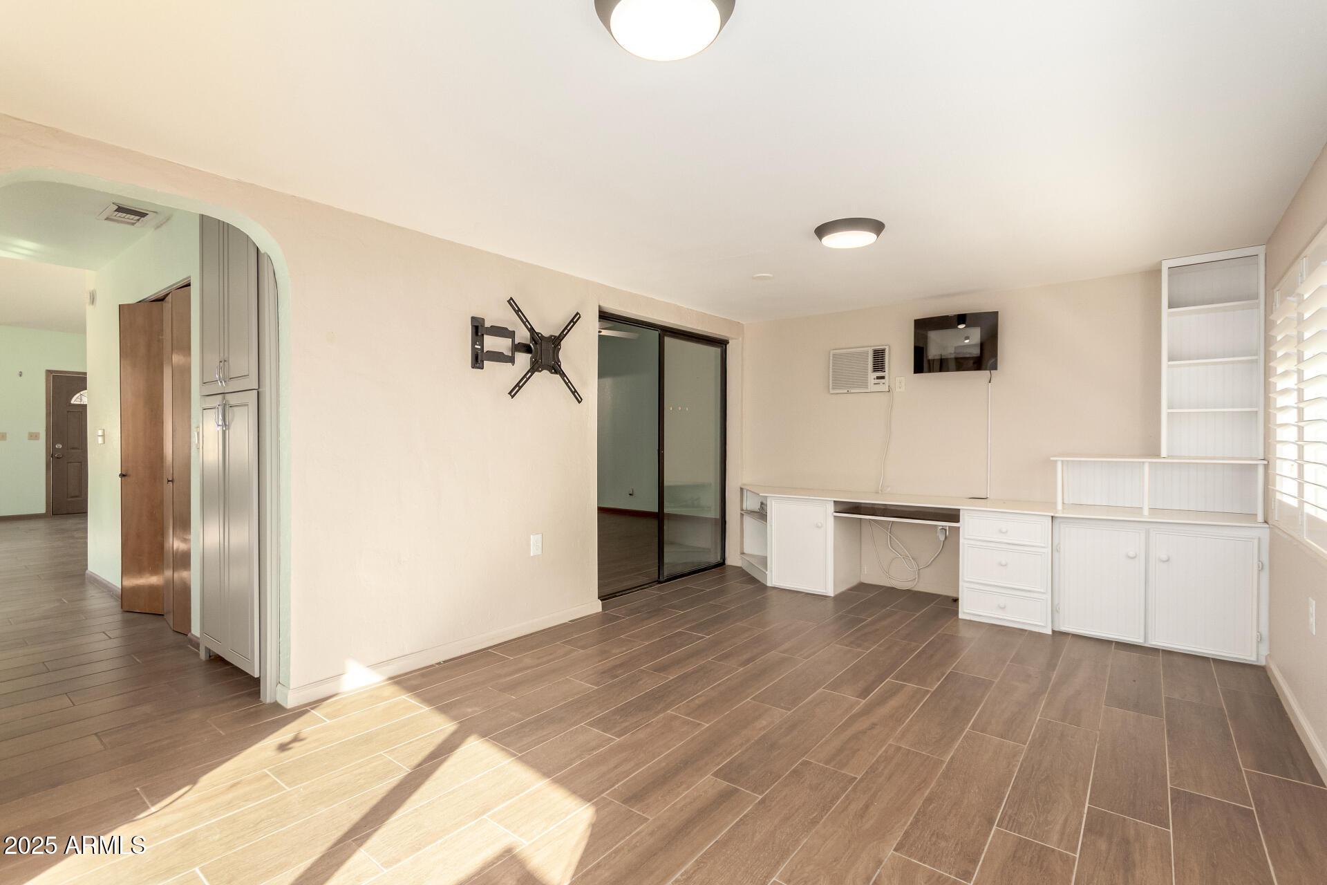 542 South Higley Road, Unit 3 Mesa, AZ 85206 - Photo 6 of 33 a view of a kitchen with a sink and a refrigerator