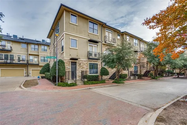 a view of a building with a street