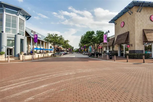 a view of a building with a street
