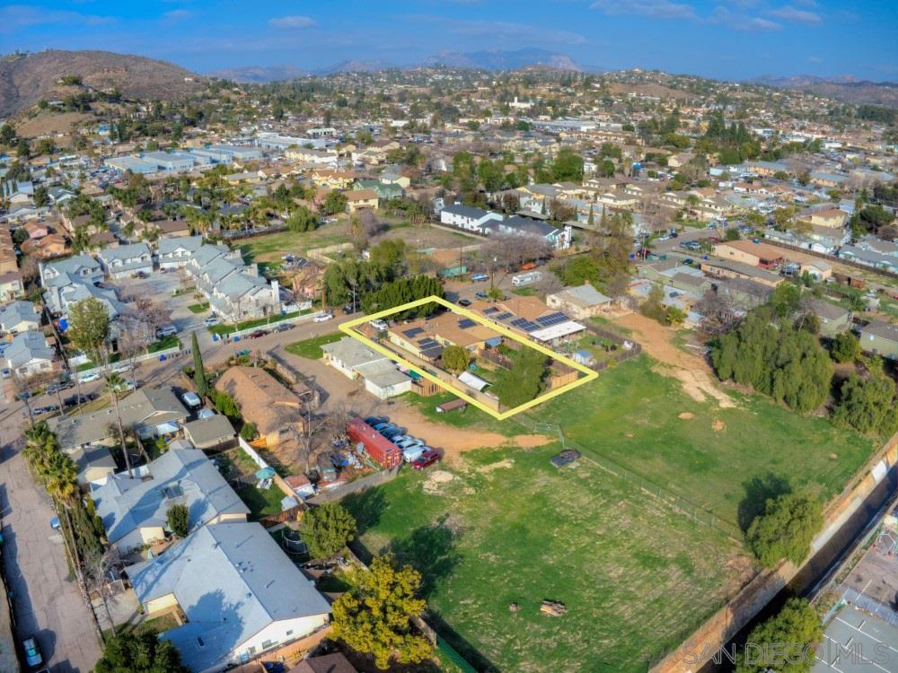 1141 Sumner Avenue El Cajon, CA 92021 - Photo 3 of 32 an aerial view of residential houses with outdoor space and trees