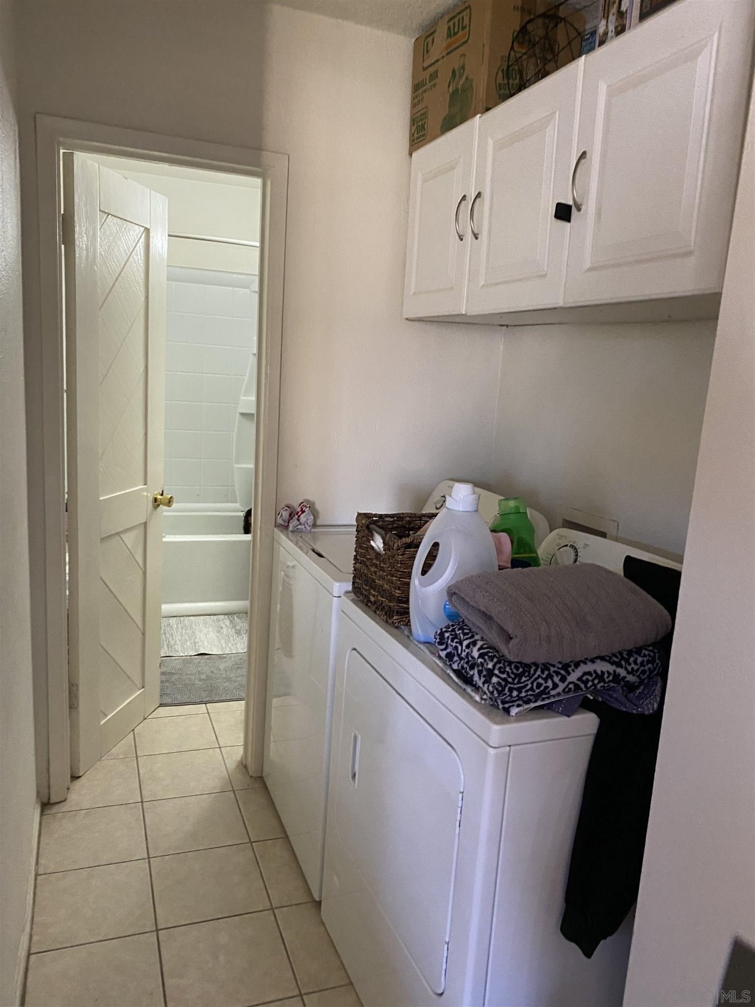 1141 Sumner Avenue El Cajon, CA 92021 - Photo 21 of 32 a bathroom with a granite countertop sink a toilet and vanity