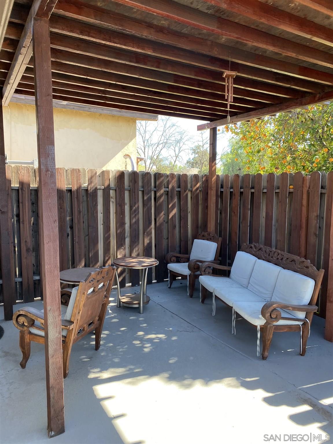 1141 Sumner Avenue El Cajon, CA 92021 - Photo 32 of 32 a living room with furniture and a large window