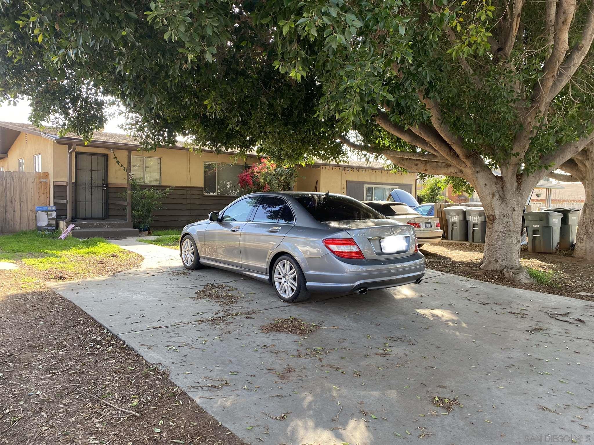1141 Sumner Avenue El Cajon, CA 92021 - Photo 5 of 32 a view of a cars parked in front of a house