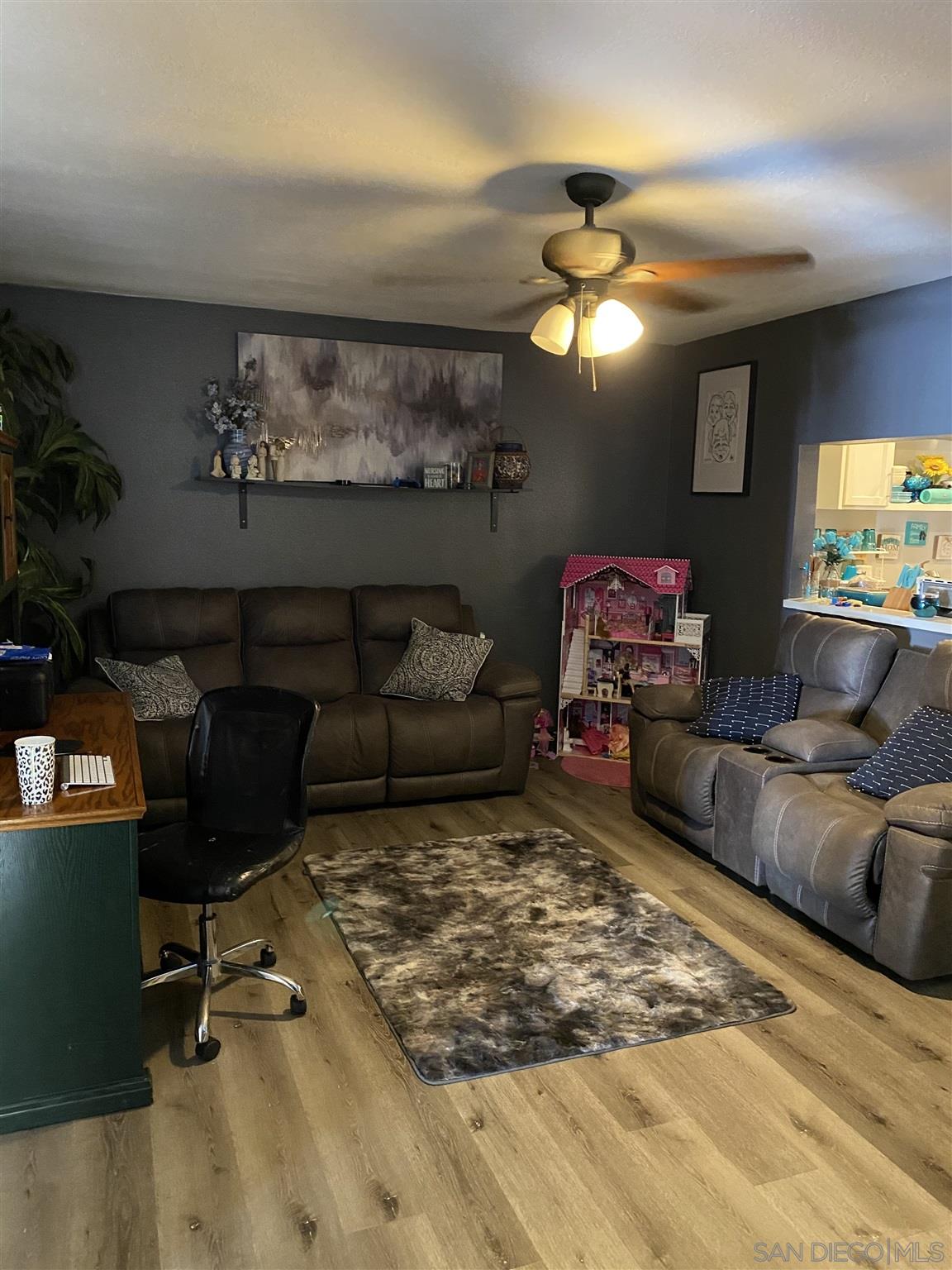 1141 Sumner Avenue El Cajon, CA 92021 - Photo 7 of 32 a living room with furniture and a flat screen tv