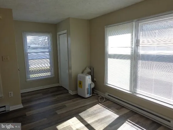 a room with furniture and a window