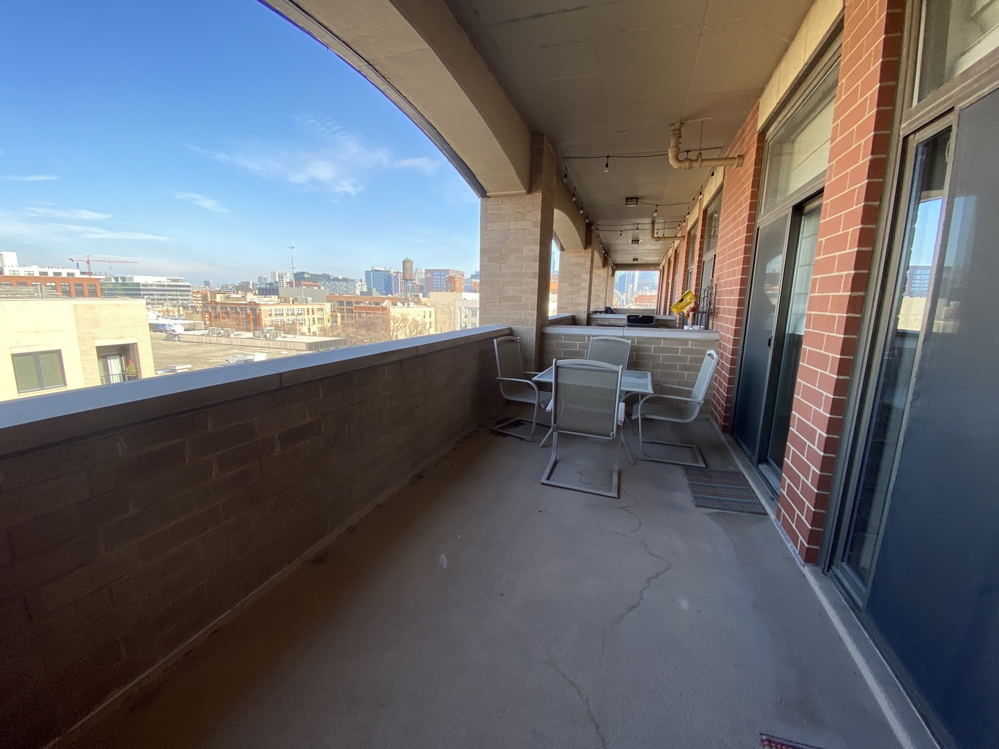 1301 West Madison Street, Unit 506 Chicago, IL 60607 - Photo 20 of 23 a living room with furniture and a large window
