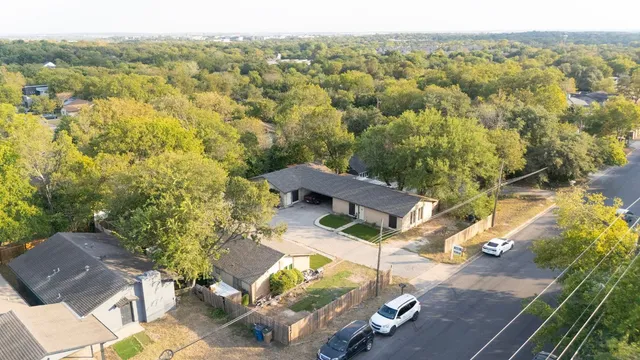 an aerial view of residential house with outdoor space