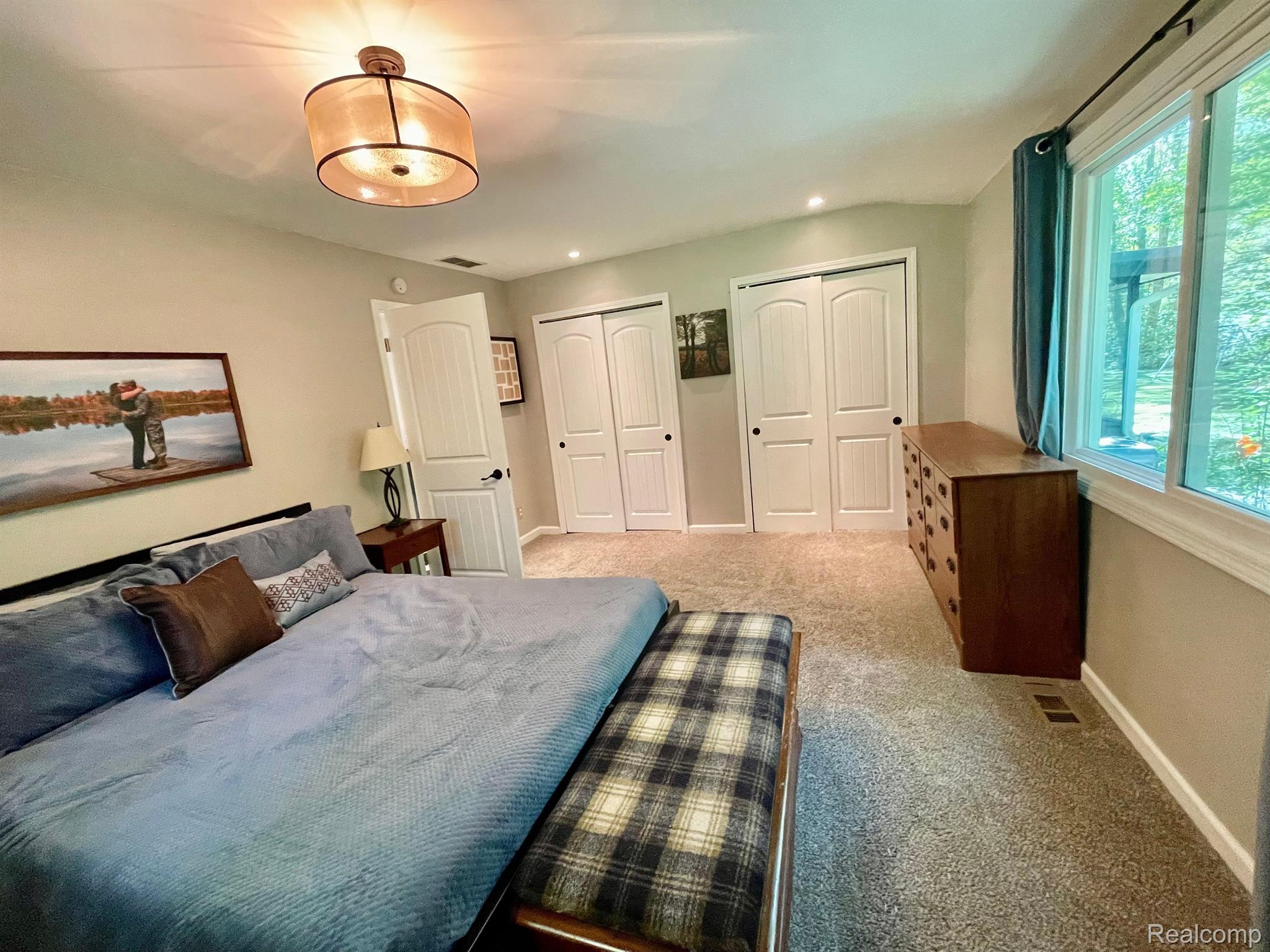 7375 Warren Road Ann Arbor, MI 48105 - Photo 43 of 57 master bedroom features double closets...