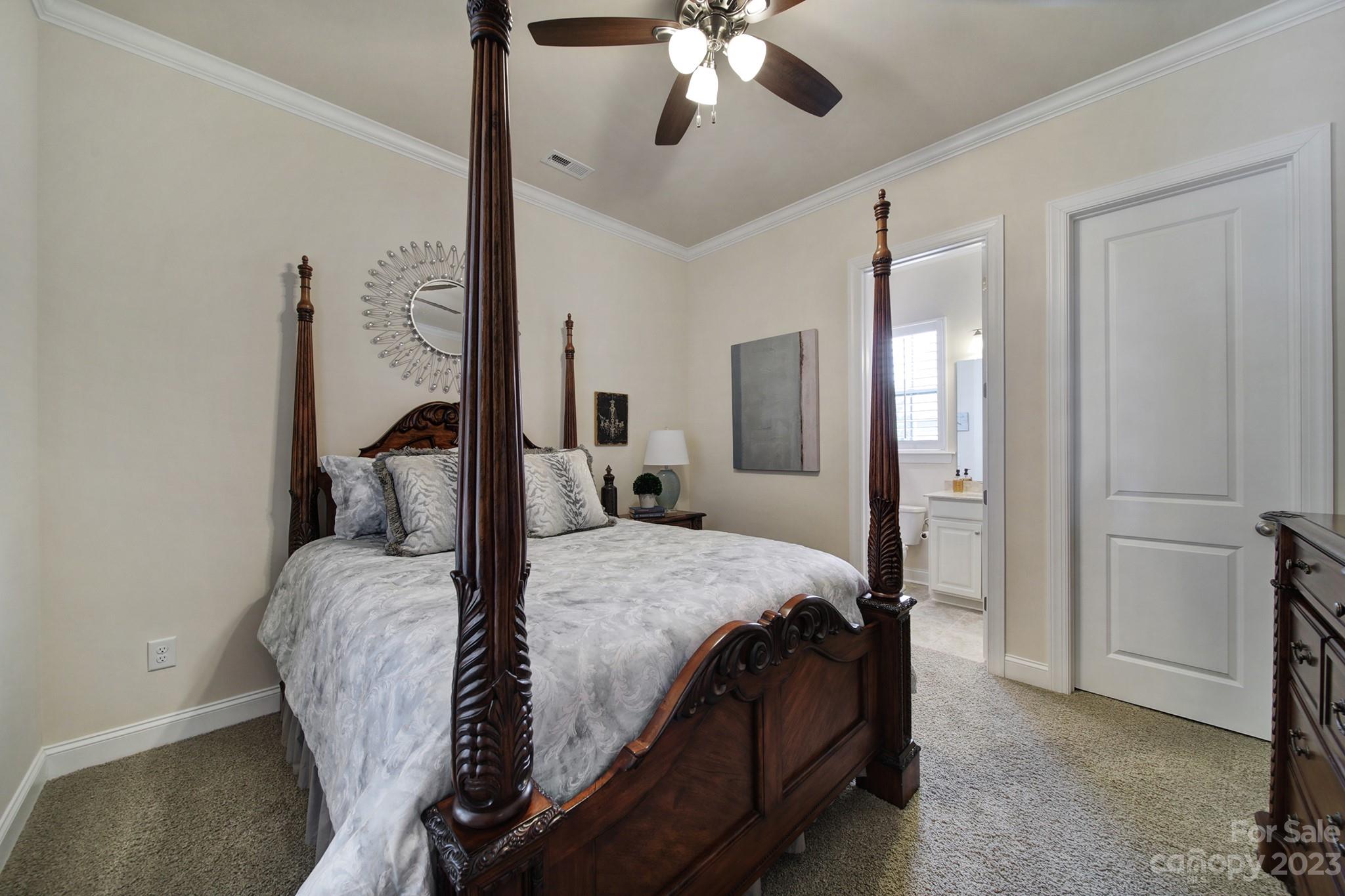 1356 Afton Way Fort Mill, SC 29708 - Photo 27 of 46 a bed room with a bed and a chandelier