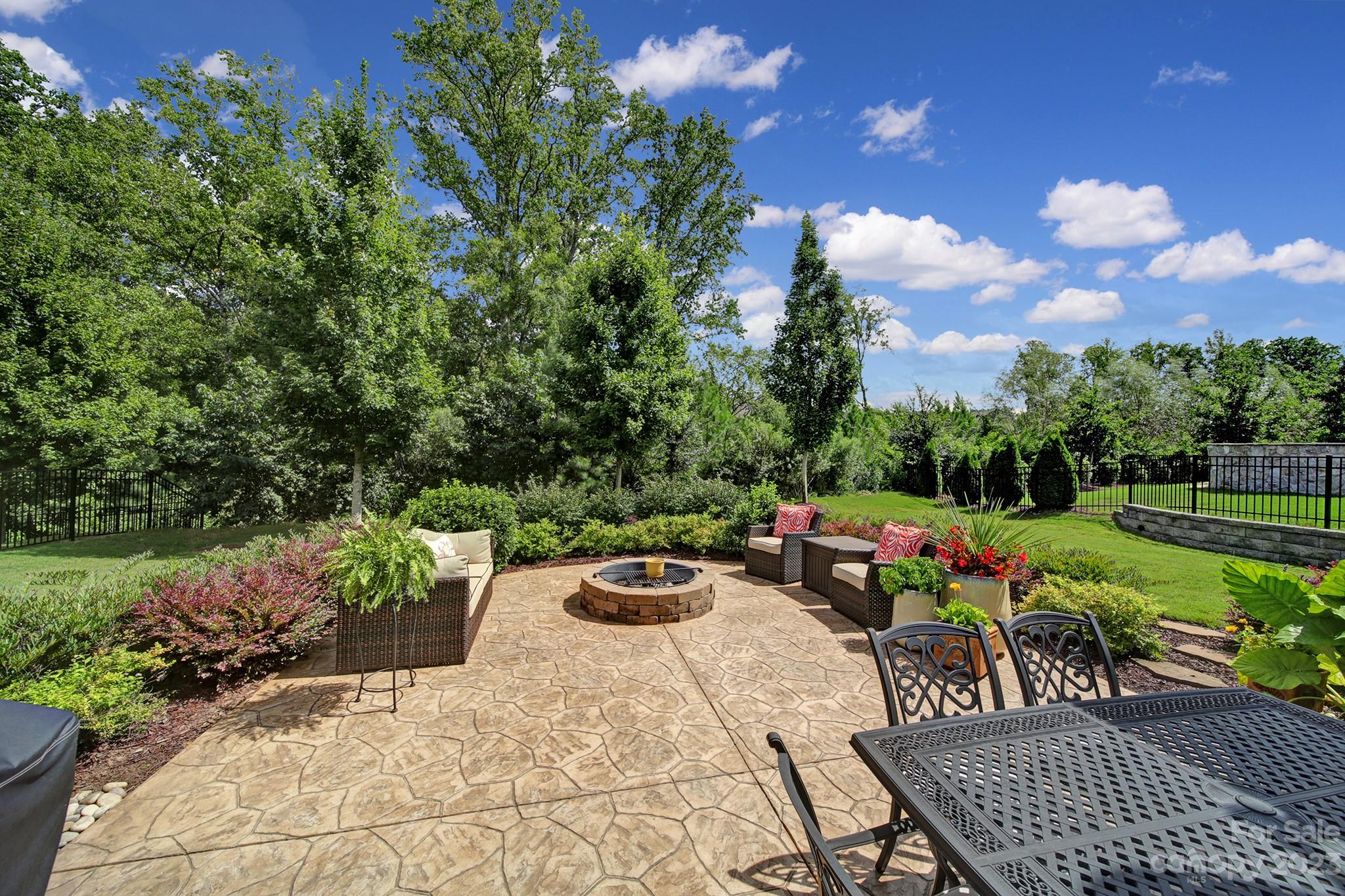 1356 Afton Way Fort Mill, SC 29708 - Photo 39 of 46 a view of outdoor space yard deck patio and fire pit