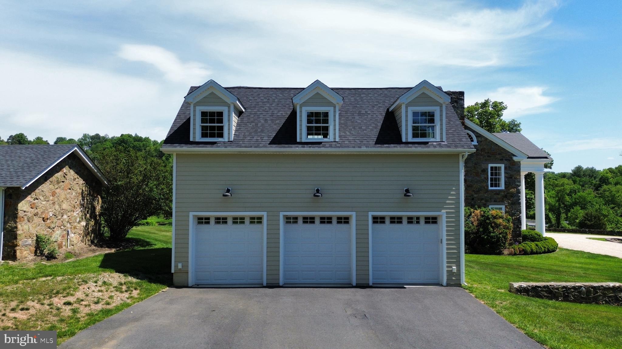 17781 Roxbury Hall Road Leesburg, VA 20175 - Photo 9 of 107 New 3-car garage with overhead loft