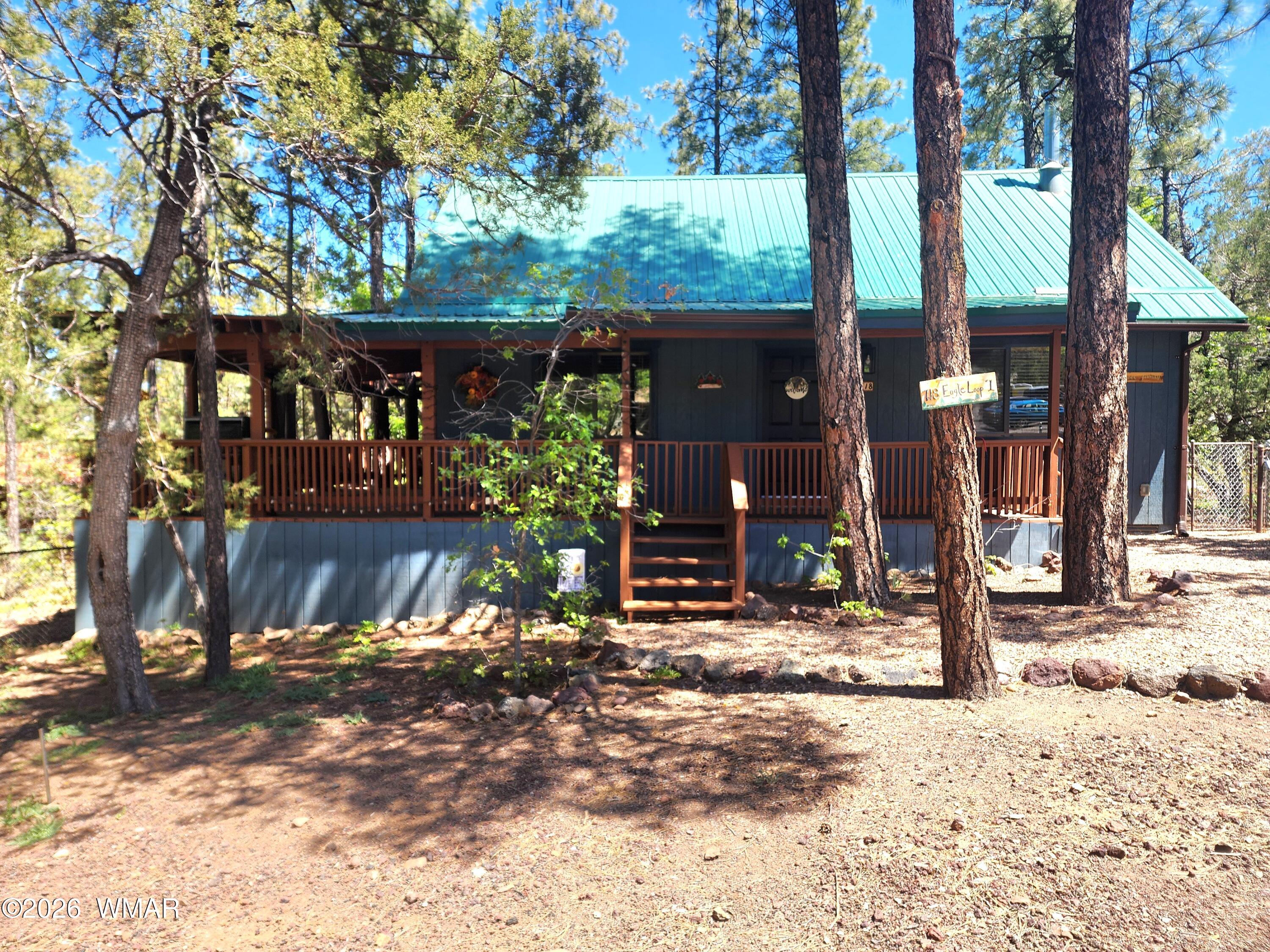 718 Eagle Loop Lakeside, AZ 85929 - Photo 1 of 31 Front View of Charming Cabin