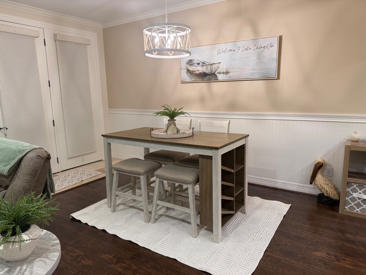 2112 Fm 3186, Unit B8 Onalaska, TX 77360 - Photo 15 of 25 a view of a dining room with furniture and wooden floor