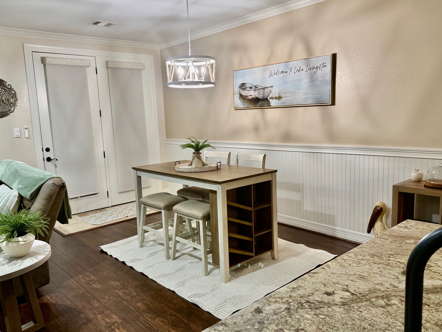 2112 Fm 3186, Unit B8 Onalaska, TX 77360 - Photo 21 of 25 a view of a livingroom with furniture and a wooden floor
