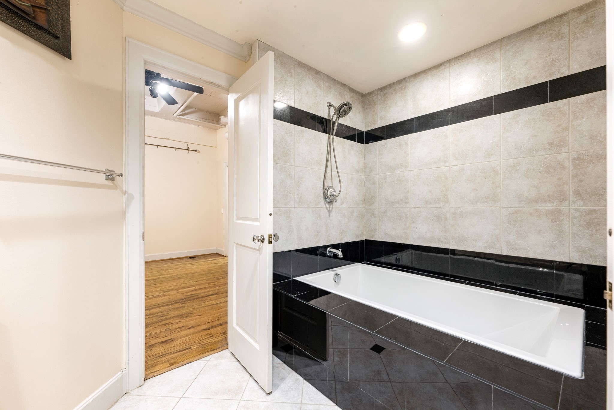 1120 Texas Street, Unit 7D Houston, TX 77002 - Photo 22 of 28 a bathroom with a sink and a shower