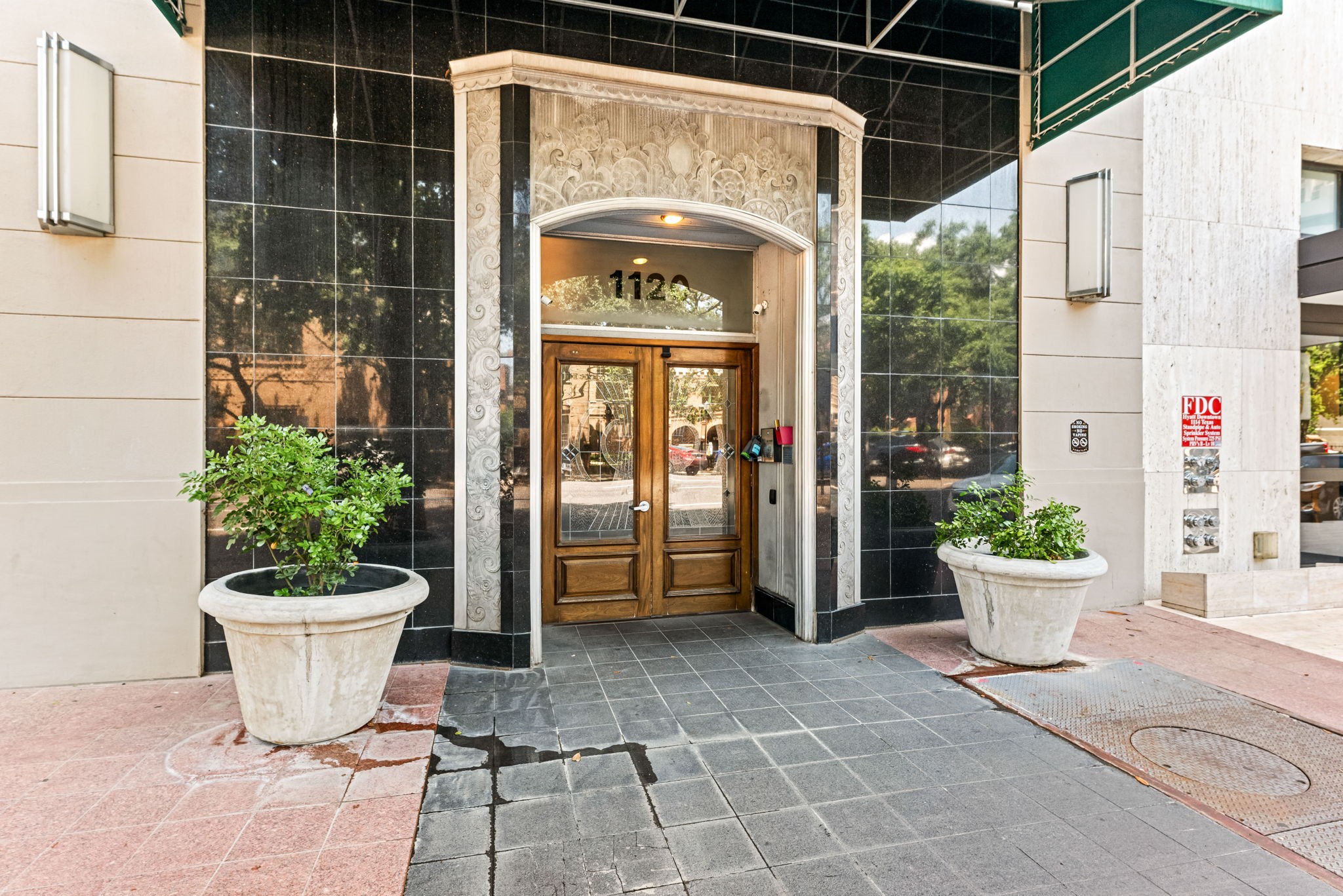 1120 Texas Street, Unit 7D Houston, TX 77002 - Photo 5 of 28 a view of a path along with potted plants