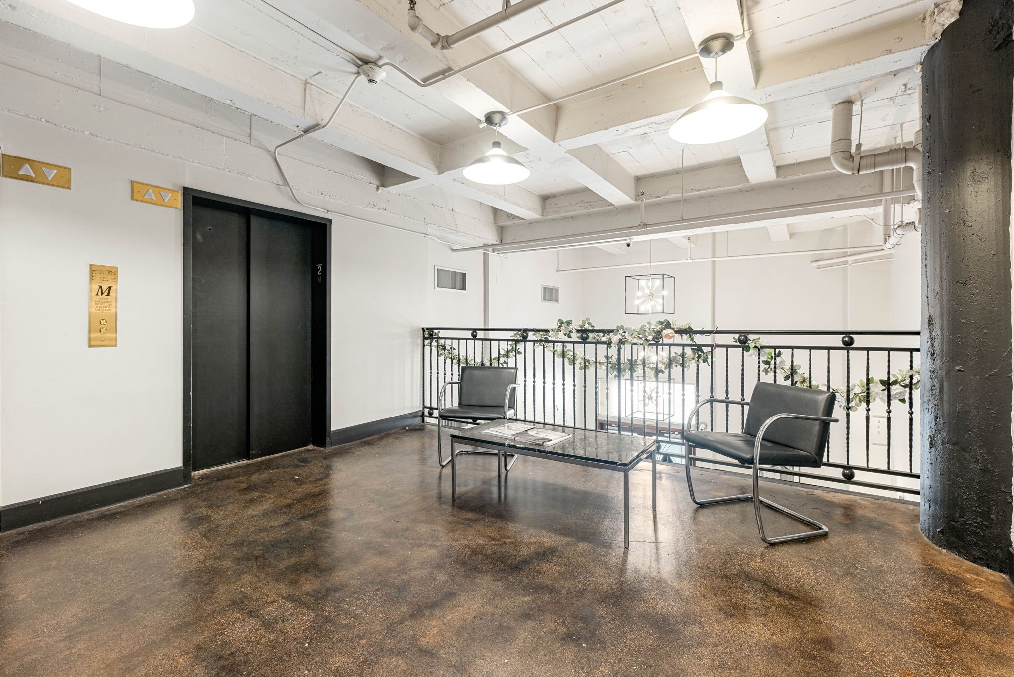 1120 Texas Street, Unit 7D Houston, TX 77002 - Photo 8 of 28 a view of a livingroom with furniture and a floor to ceiling window
