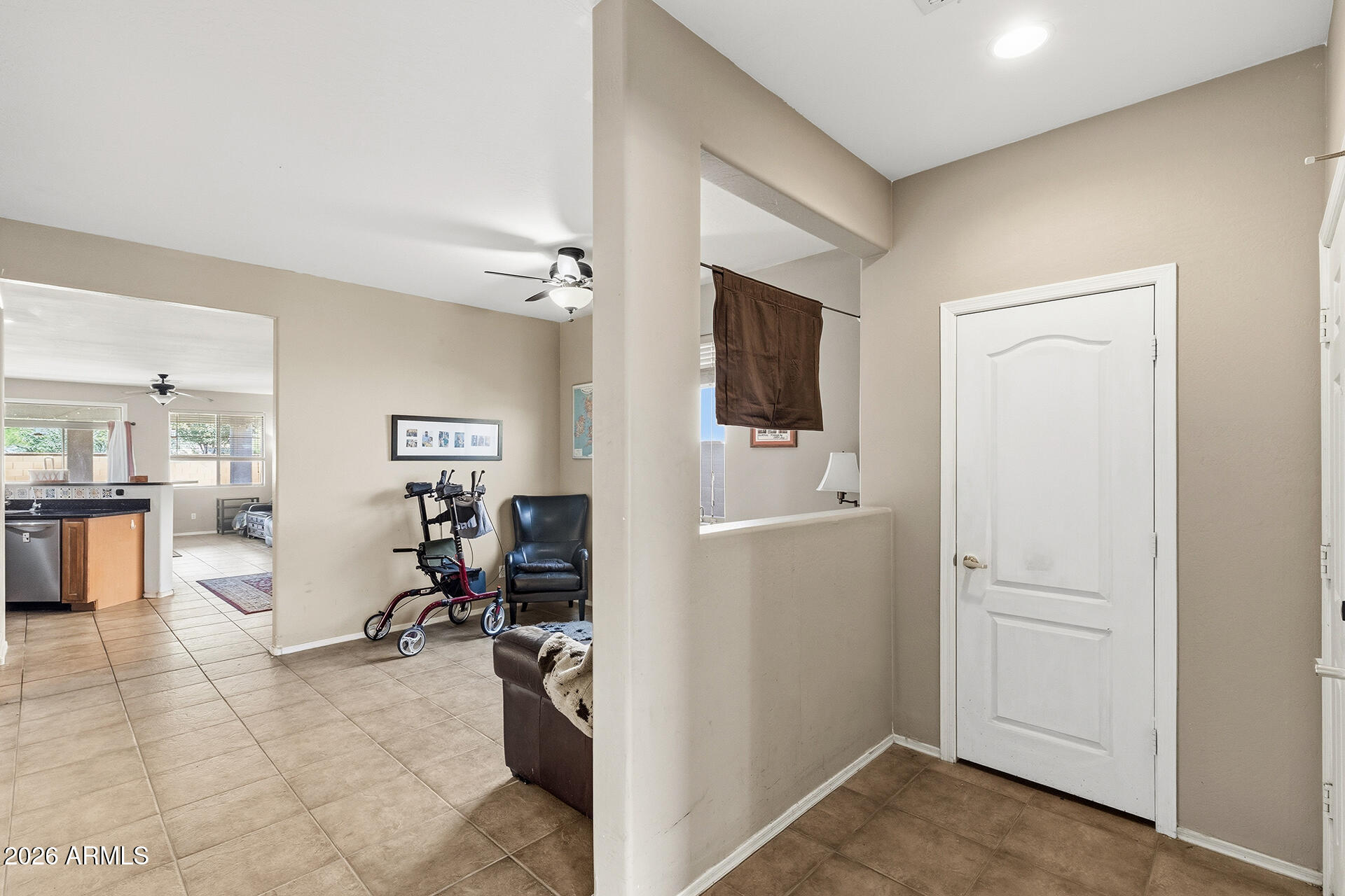 6718 West Darrel Road Laveen, AZ 85339 - Photo 25 of 49 a view of a livingroom with furniture and a flat screen tv
