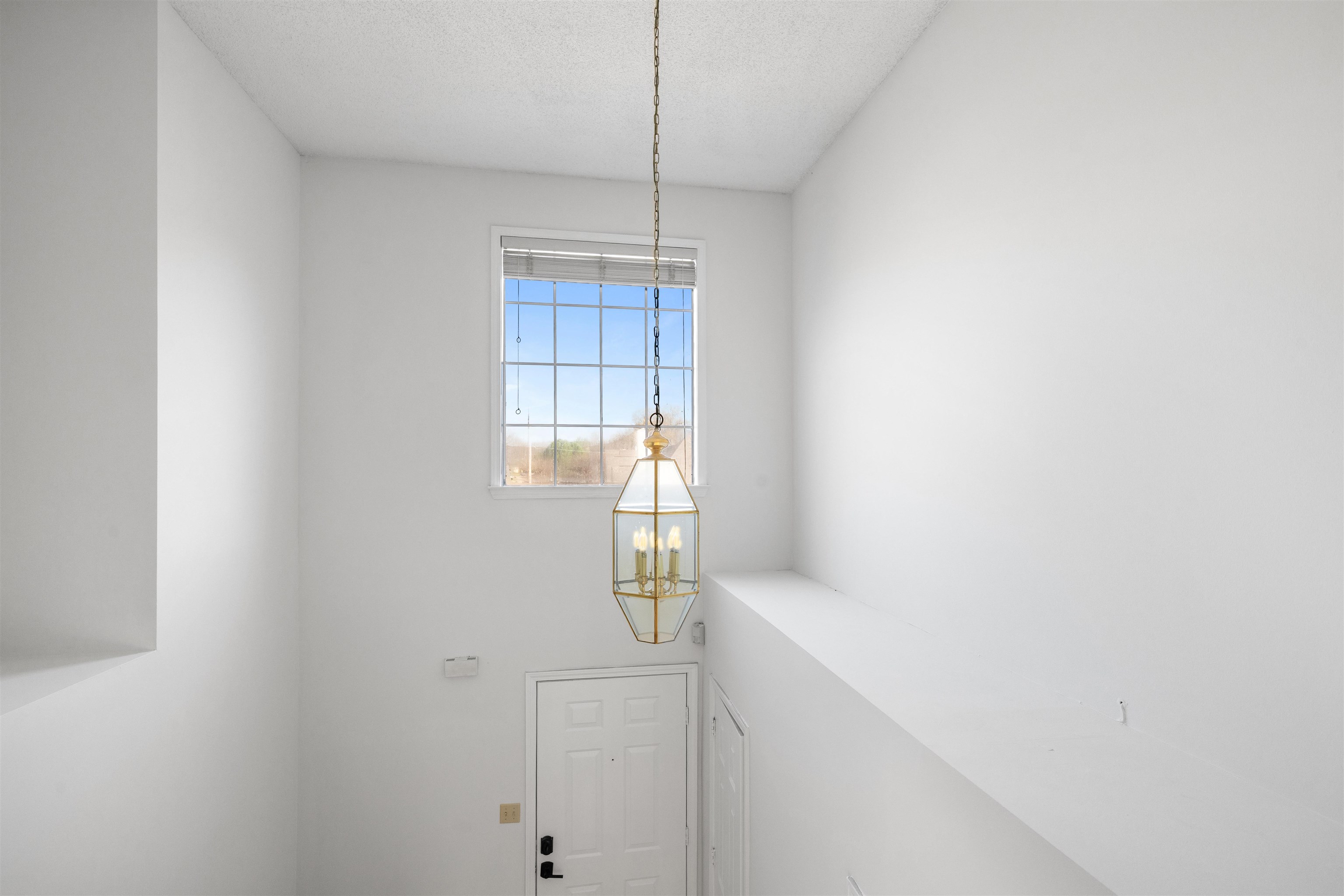 7361 Appling Ridge Drive Cordova, TN 38018 - Photo 19 of 31 Detailed view of suspended lighting and a textured ceiling