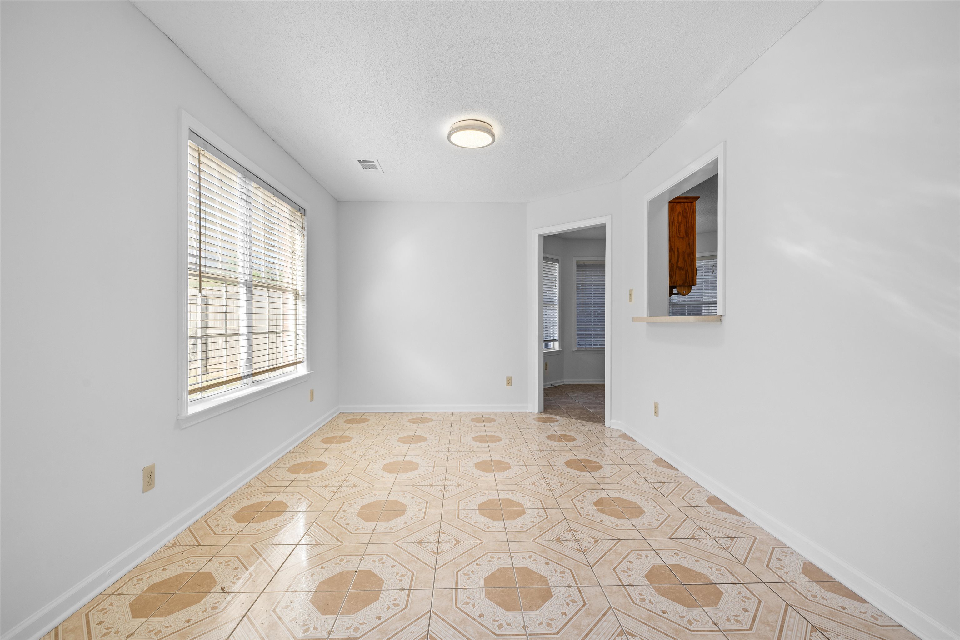 7361 Appling Ridge Drive Cordova, TN 38018 - Photo 7 of 31 Spare room with light tile patterned floors and baseboards