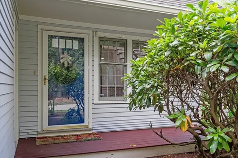 a backyard of a house with lots of green space
