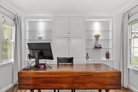 a room with table and chairs