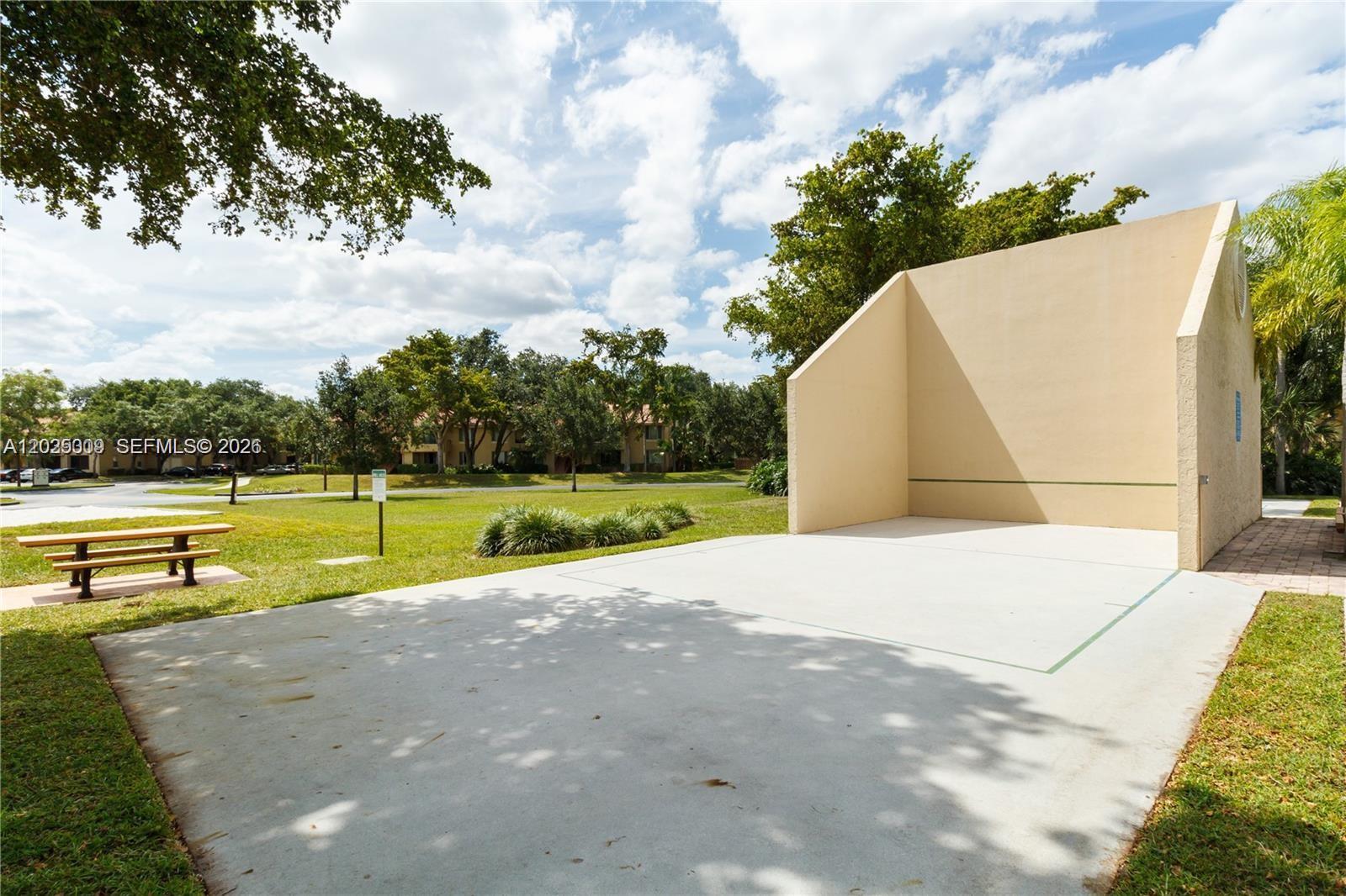 951 Lyons Road, Unit 6206 Coconut Creek, FL 33063 - Photo 14 of 27 a view of swimming pool with a yard