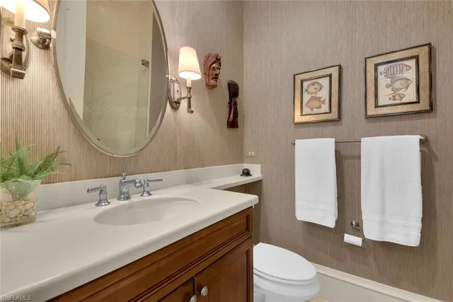 a bedroom with a bed and dresser