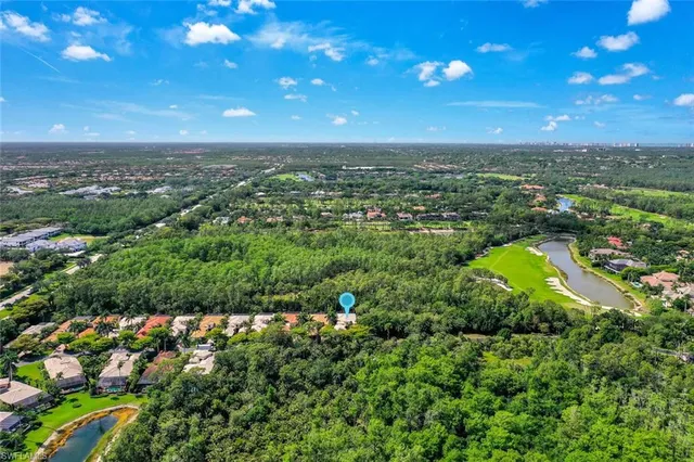 a view of a city with lots of green space