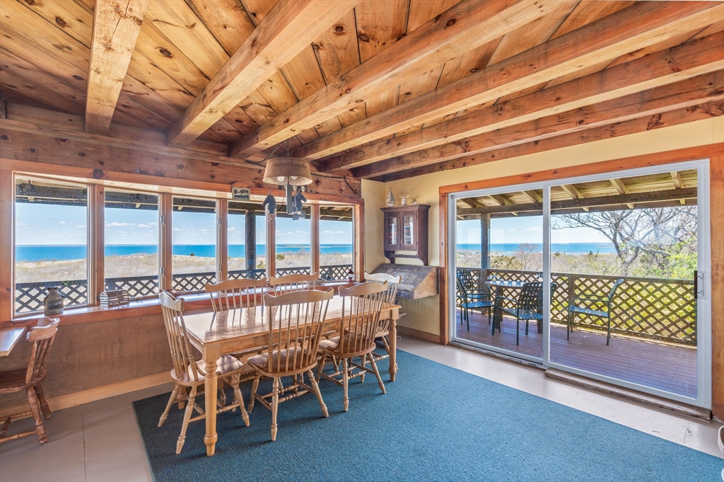 0 Bayberry Hill Road Cuttyhunk, MA 02713 - Photo 5 of 12 a dining room with furniture water view and balcony