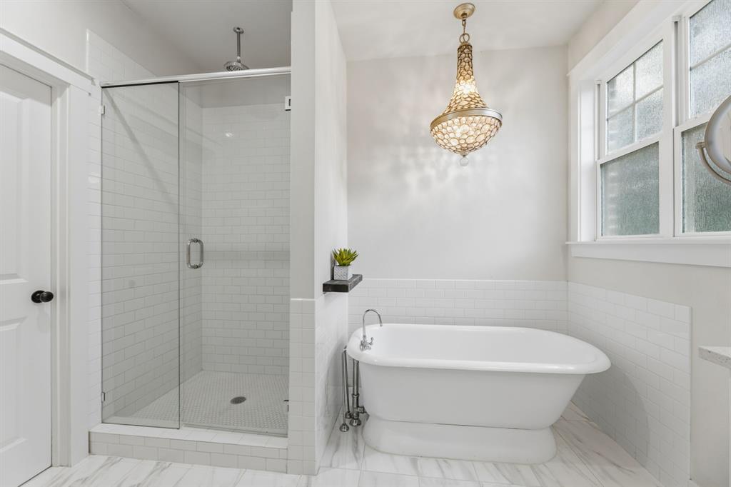 665 Chinn Chapel Road Copper Canyon, TX 75077 - Photo 19 of 26 a white bath tub sitting next to a shower
