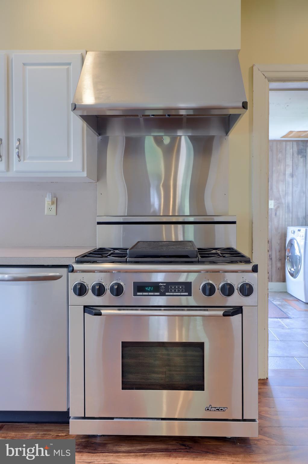 1141 Letort Road Conestoga, PA 17516 - Photo 14 of 49 a stove top oven sitting inside of a kitchen