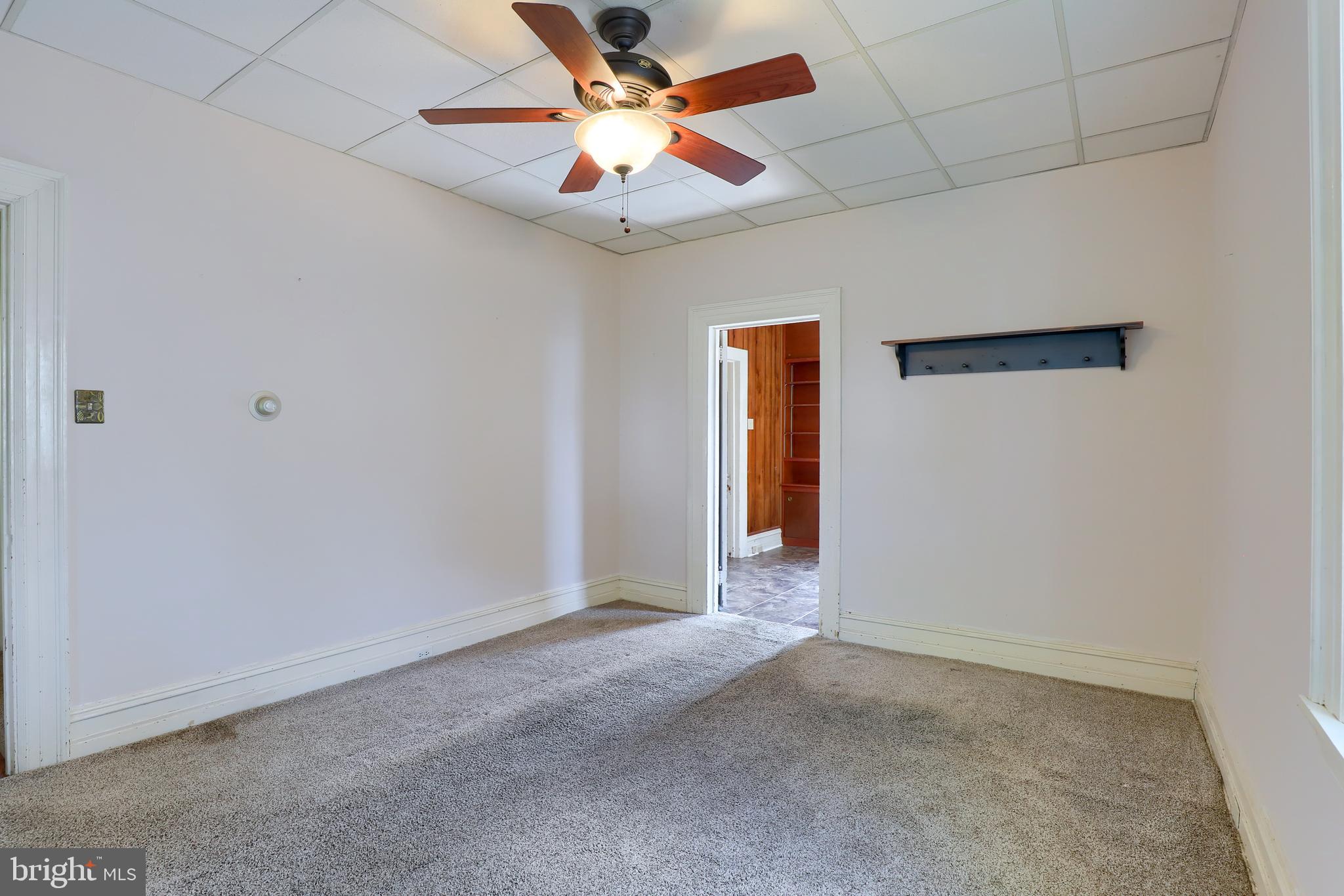 1141 Letort Road Conestoga, PA 17516 - Photo 20 of 49 an empty room with a ceiling fan and carpet