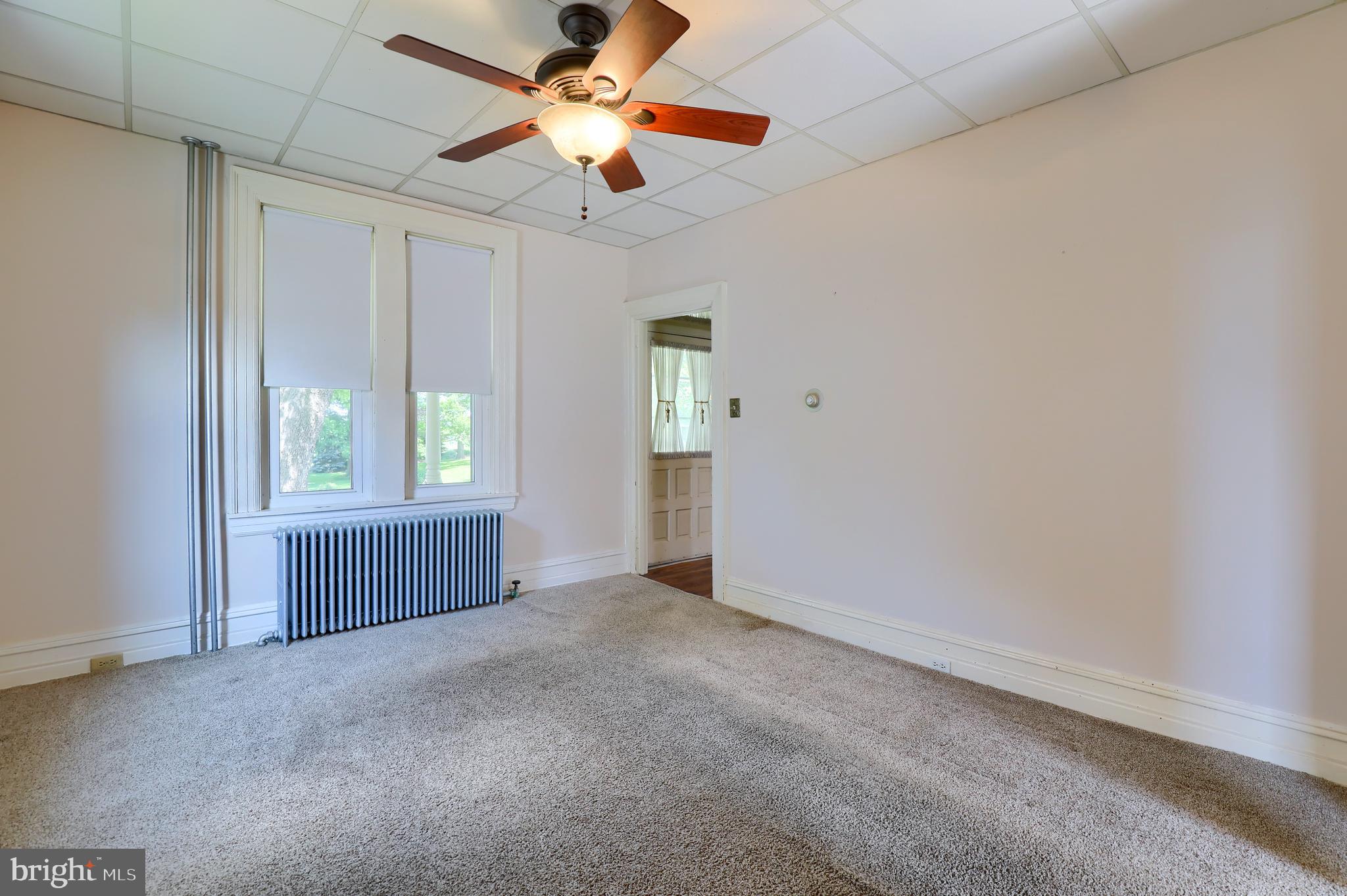 1141 Letort Road Conestoga, PA 17516 - Photo 21 of 49 wooden floor in an empty room with a window
