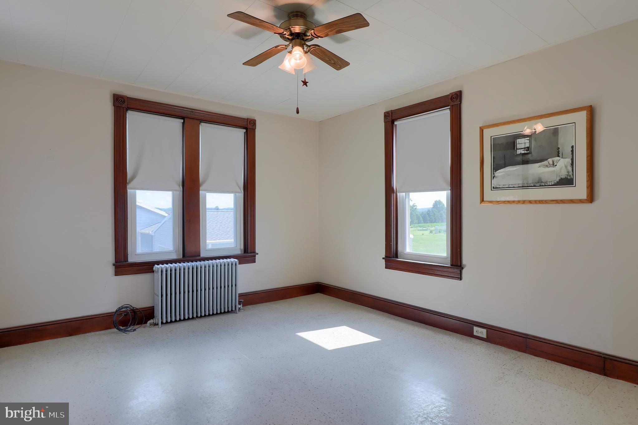 1141 Letort Road Conestoga, PA 17516 - Photo 29 of 49 a view of an empty room with a window and wooden floor